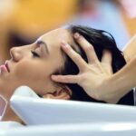 beautiful-young-woman-washes-hair-in-a-beauty-salon